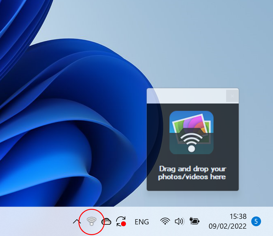 PhotoSync icon in the Windows taskbar